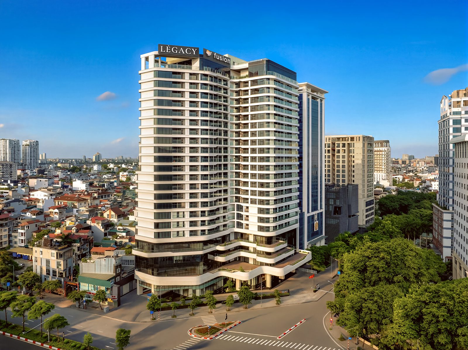 LÈGACY Hanoi tower in daylight, seen above the surrounding streets