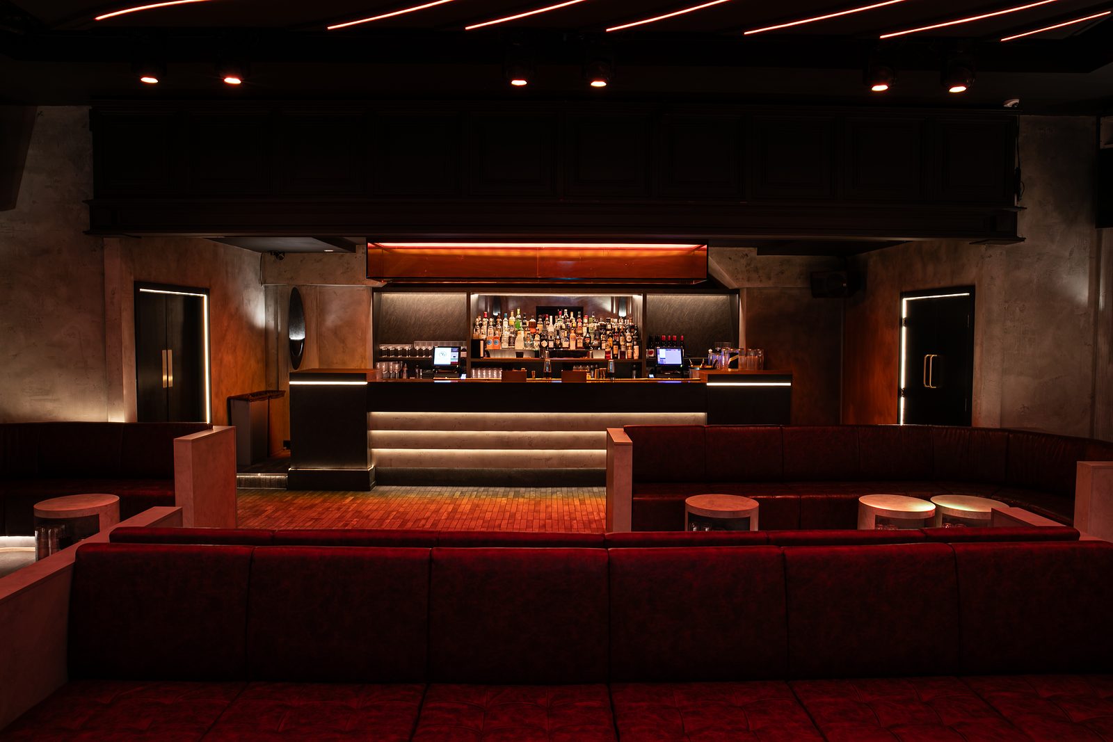 Bar and booth seating in The Club Room at NinetyNine Regent Street