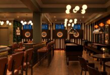Visualisation of the Rocket Room games area, with AI darts lanes, shuffleboard tables, pool and bar seating
