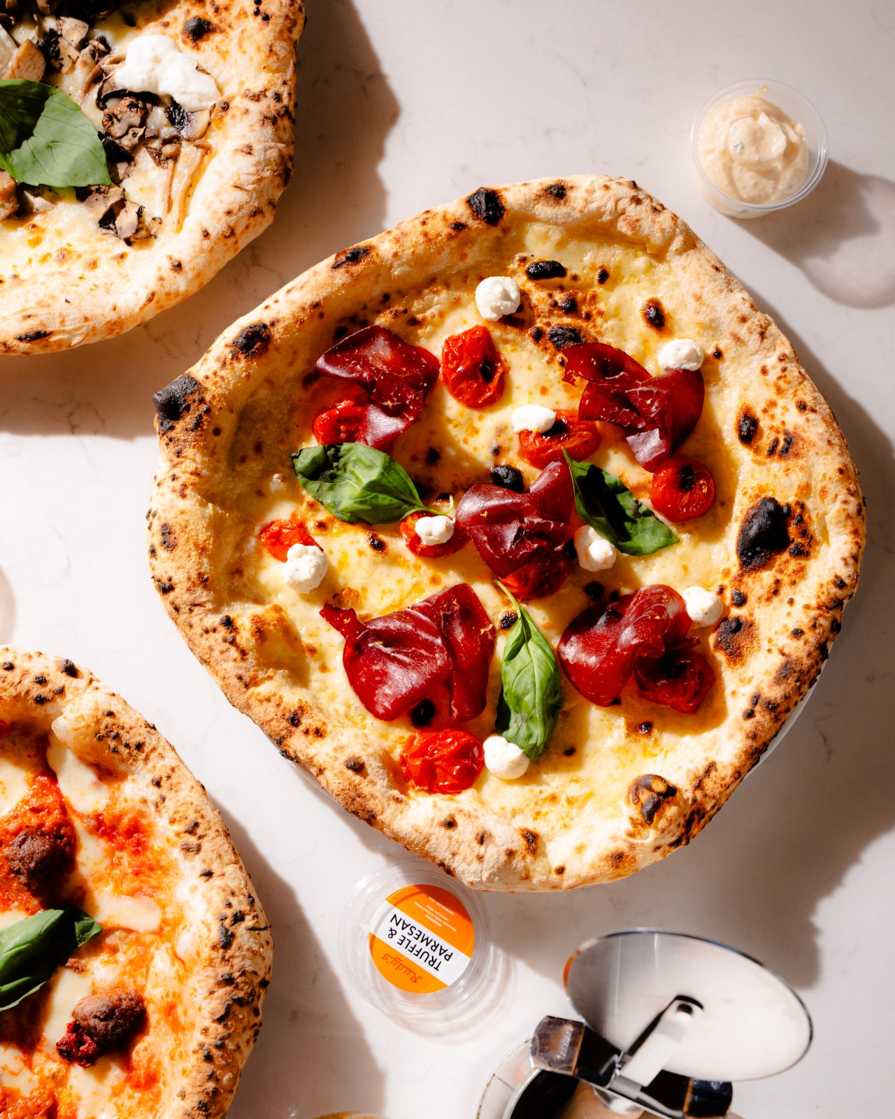 The Peppe special pizza with bresaola, ricotta and confit tomatoes at Rudy’s Pizza Napoletana