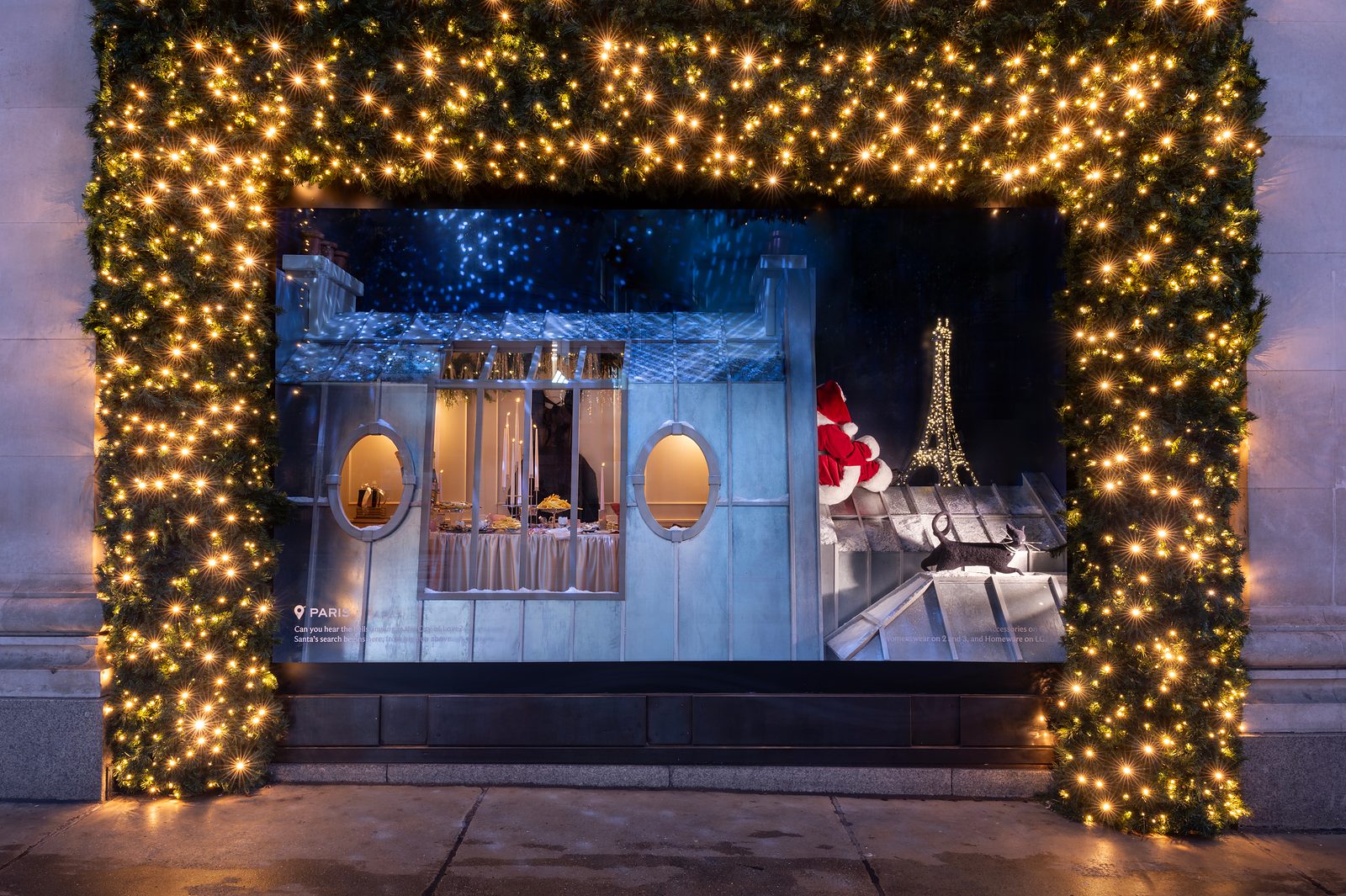 Selfridges' Paris Christmas window, a zinc rooftop scene with Santa and the Eiffel Tower